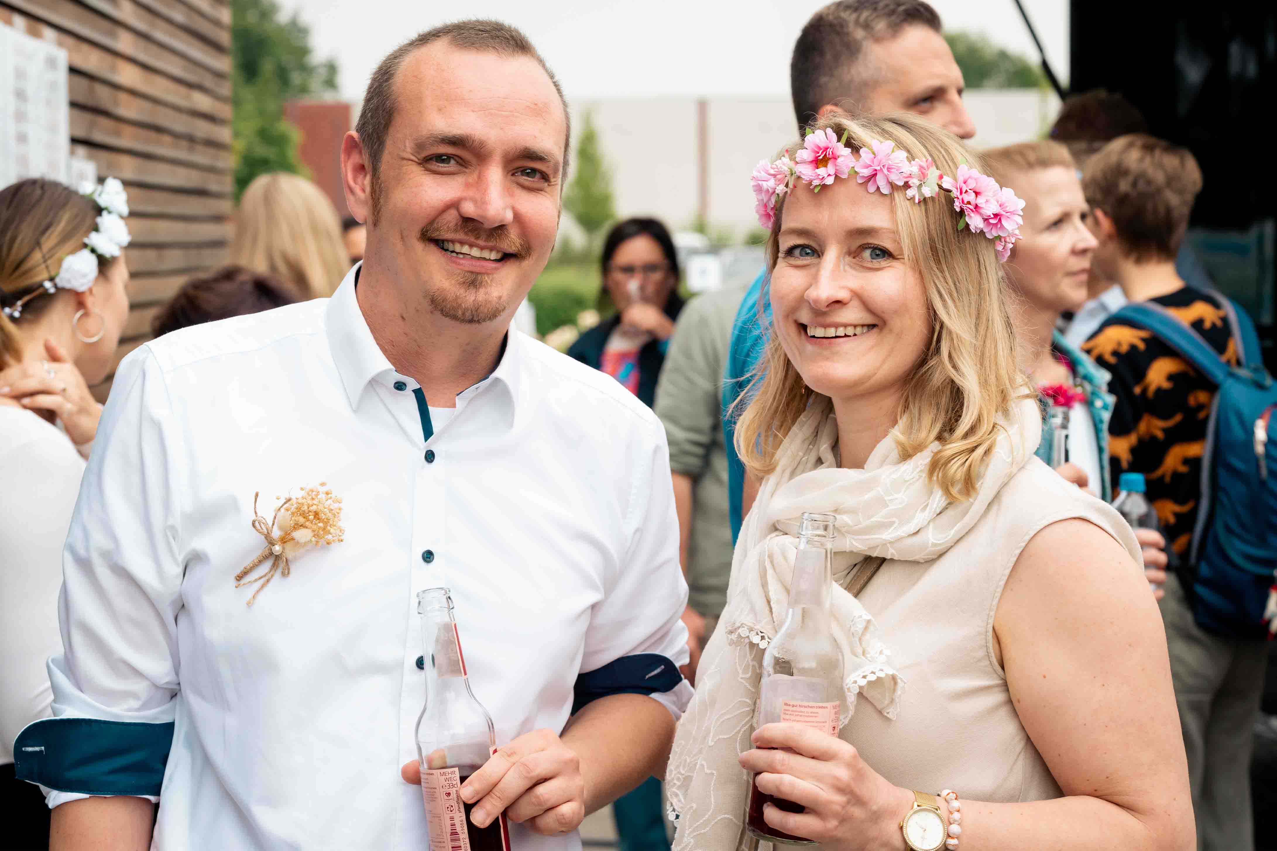 shirt, man, woman, flower crown, beverage bottle